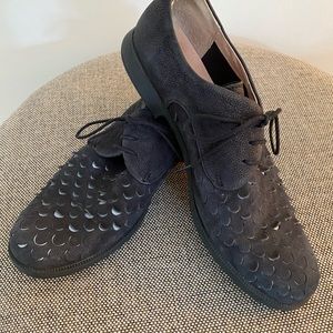 Woman’s designer shoes. Black Swede with unique details.